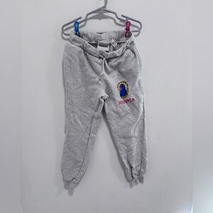 Mini Rodini Light Gray Sweatpants with Blue Parrot Embroidery